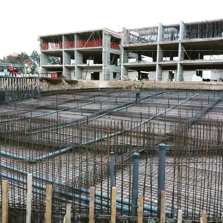 Pool pipework installed within steel reinforcement before concrete pouring
